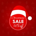 Christmas sale and discount banner isolated on Xmas pattern. 50% price off badge with Santa Claus hat. Shopping decoration concept Royalty Free Stock Photo